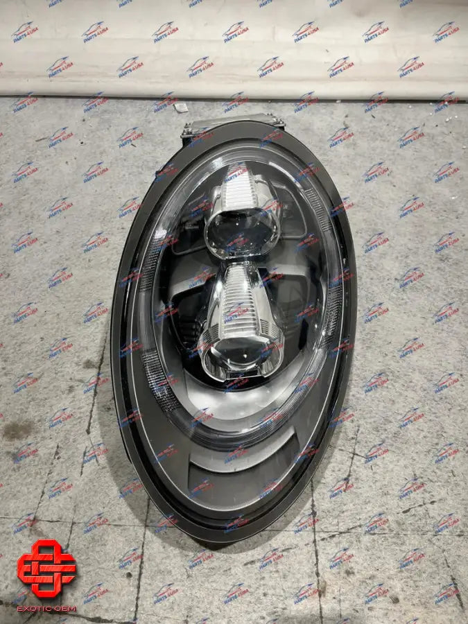 PORSCHE 911 LEFT HEADLIGHT OEM
