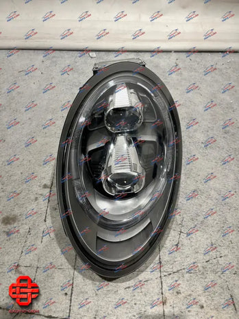 PORSCHE 911 LEFT HEADLIGHT OEM